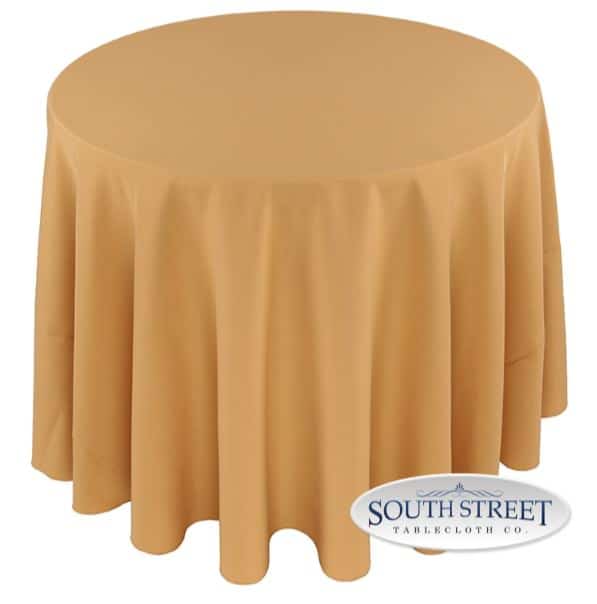 A table with a camel-colored cover