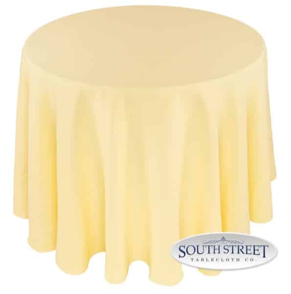 A table with a light yellow-colored cover